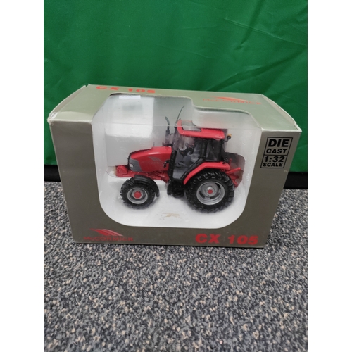 623 - McCormick CX105 1:32 scale die cast tractor.