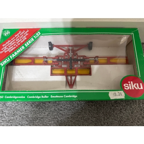 654 - Siku metal 1:32 Cambridge roller