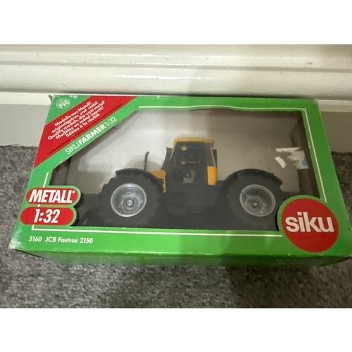 655 - Siku metal 1:32 JCB Fastrac 2150