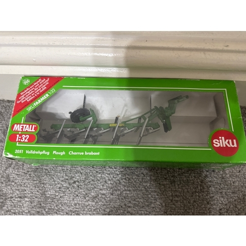 658 - Siku metal 1:32 Plough