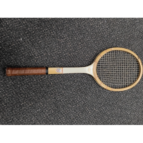 663 - A trio of vintage tennis rackets; Makes include Sondico blue star, Tuftex Junior and Slazenger Royal... 