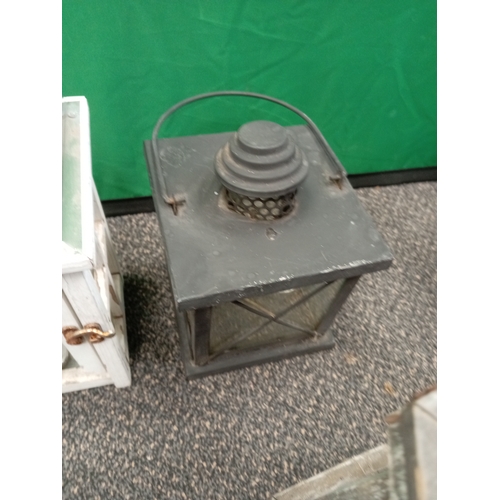 674 - Lot of vintage lanterns, including a large metal and glass one.