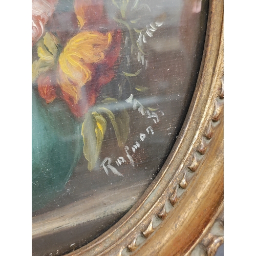 685 - An antique Ornate oval framed still life oil painting of flowers in a vase. Signed. H 23cm x W 18cm