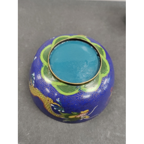 689 - A antique oriental cloisonne brass and enamel. With dragon patterns along the sides. H 5cm x W 11cm.