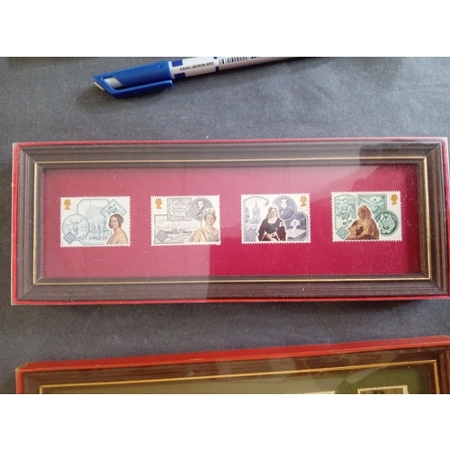 537 - Four framed and boxed sets of stamps including architecture, trains, coats of arms, commemorative.