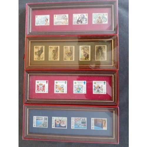 537 - Four framed and boxed sets of stamps including architecture, trains, coats of arms, commemorative.