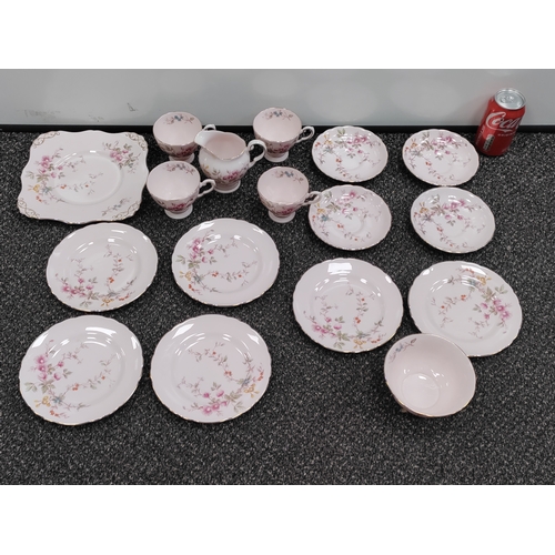 721 - A collection of pink and floral pattern Tuscan fine English bone china. Set includes 4 tea cups, 4 s... 