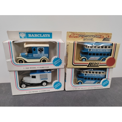 731 - A collection of 4 1980s Lledo limited edition Barclays advertising vans and buses.