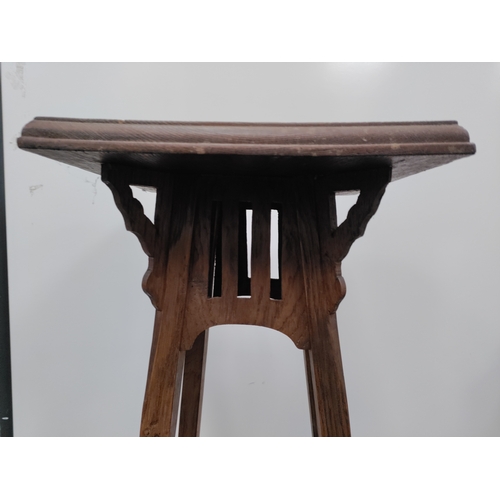 736 - A vintage oak plant stand. H 94cm x W 30cm.