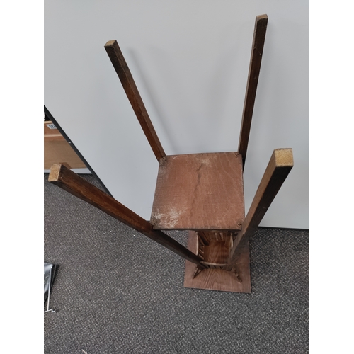 736 - A vintage oak plant stand. H 94cm x W 30cm.