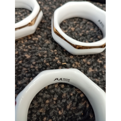 2 - Set of 8 vintage AJL bone China napkin rings.