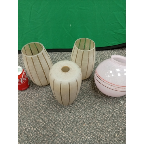 29 - Three vintage glass lampshades and a pink art Deco table lampshade.