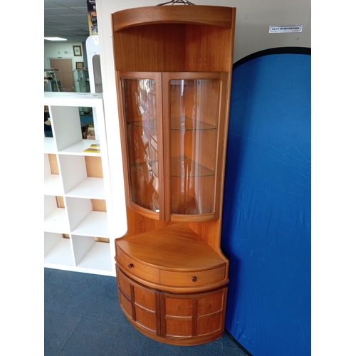 100 - A mid century Modern MCM teak Parker Knoll Nathan Corner display cabinet. Measures H 194cm x D 44cm ... 