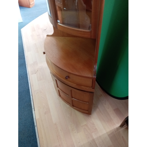 101 - A mid century Modern MCM teak Parker Knoll Nathan Corner display cabinet. Measures H 194cm x D 44cm ... 