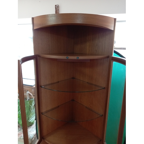 101 - A mid century Modern MCM teak Parker Knoll Nathan Corner display cabinet. Measures H 194cm x D 44cm ... 