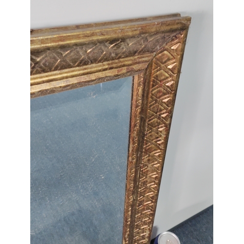114 - A vintage gold gilt framed bevelled edge mirror. H 63cm x W 53cm.