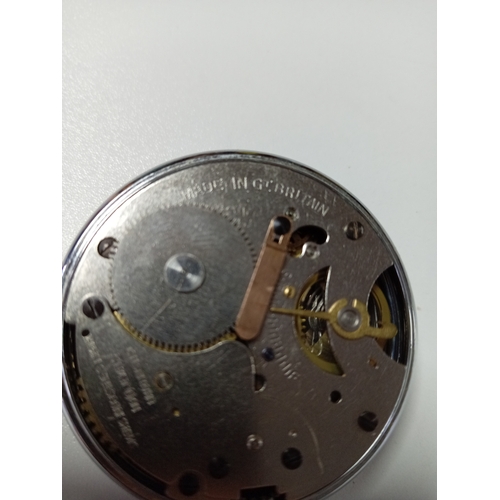 121 - A working vintage Smiths pocket watch. Small crack on face.