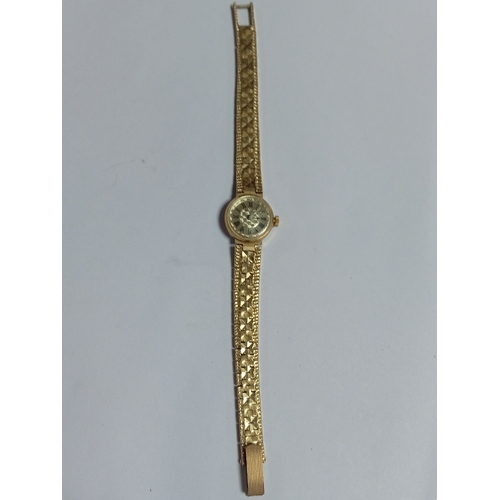 57 - A yellow metal sekonda watch 17 jewels.