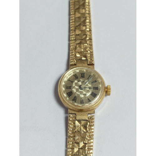 57 - A yellow metal sekonda watch 17 jewels.