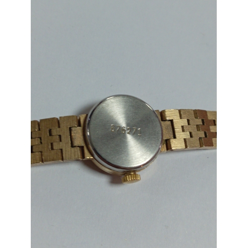 57 - A yellow metal sekonda watch 17 jewels.