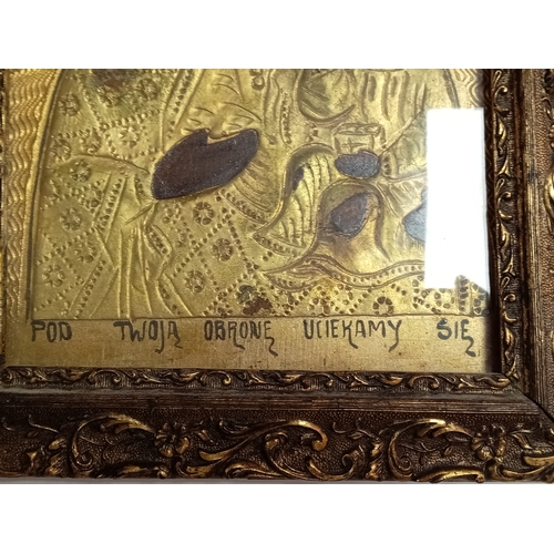 252 - An antique handpainted religious icon of The Black Madonna of Czestochowa Poland in a gold gilt fram... 