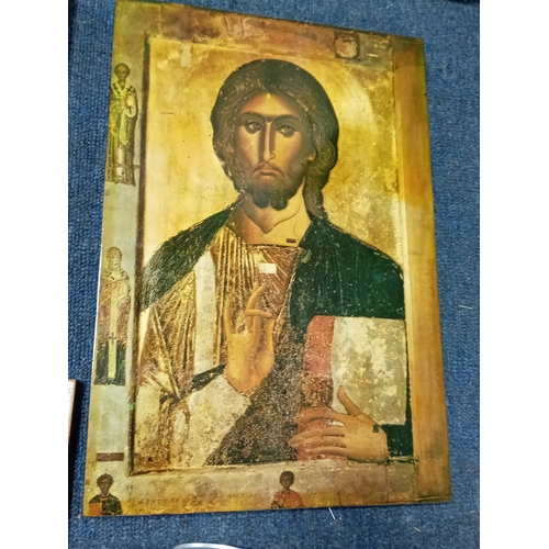 254 - A collection of 6 religious icon prints on wood one is carved.