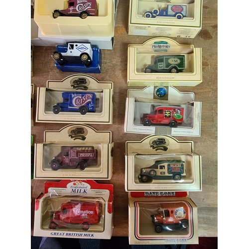 178 - A large collection of 33 Diecast Model Vans and Cars, all with packaging.
Mainly advertising vans su... 