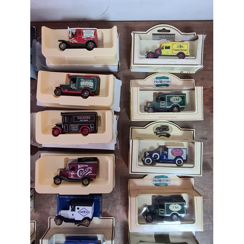178 - A large collection of 33 Diecast Model Vans and Cars, all with packaging.
Mainly advertising vans su... 