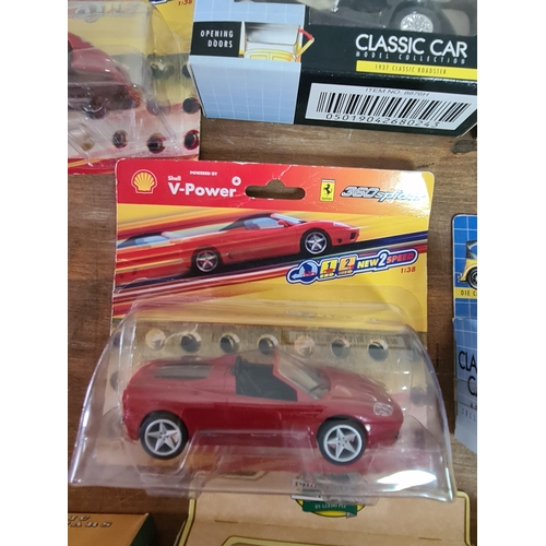 178 - A large collection of 33 Diecast Model Vans and Cars, all with packaging.
Mainly advertising vans su... 