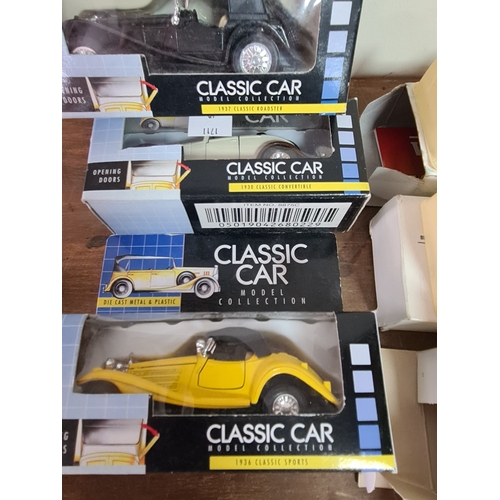 178 - A large collection of 33 Diecast Model Vans and Cars, all with packaging.
Mainly advertising vans su... 