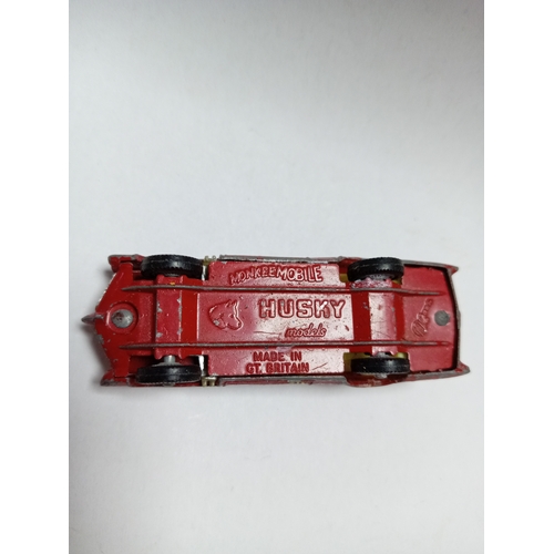 179 - A vintage husky models MONKEEMOBILE toy car with original figures in.