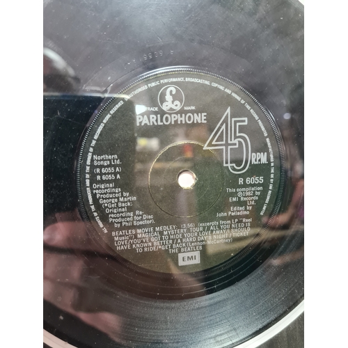 101 - Collection of The Beatles glass framed photos, vinyl (Movie Medley), autographs & film cells. 1962 m... 