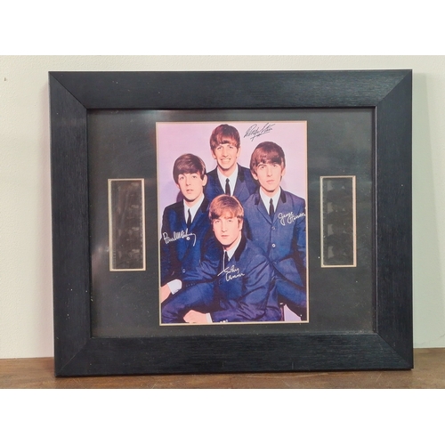 101 - Collection of The Beatles glass framed photos, vinyl (Movie Medley), autographs & film cells. 1962 m... 