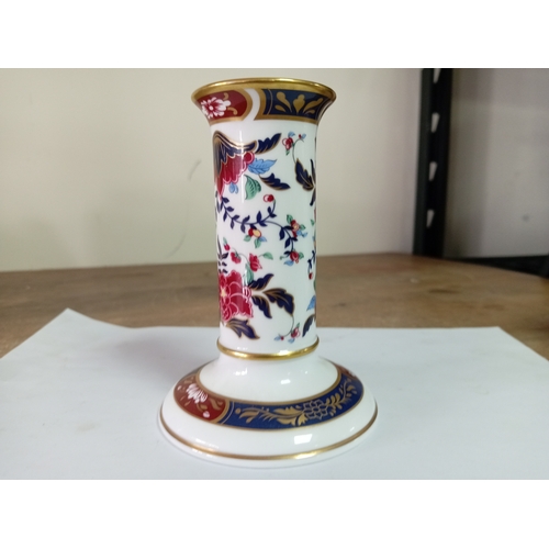 26 - A Royal Worcester ceramic clock and candlestick both with floral design.