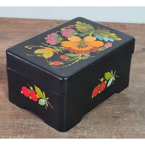 27 - 2 vintage black lacquered lidded boxes with hand painted floral designs, the square Victorian style ... 