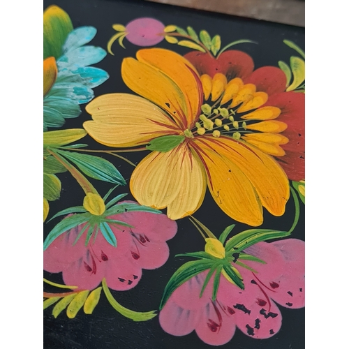 27 - 2 vintage black lacquered lidded boxes with hand painted floral designs, the square Victorian style ... 