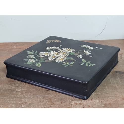 27 - 2 vintage black lacquered lidded boxes with hand painted floral designs, the square Victorian style ... 