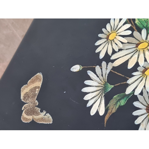 27 - 2 vintage black lacquered lidded boxes with hand painted floral designs, the square Victorian style ... 