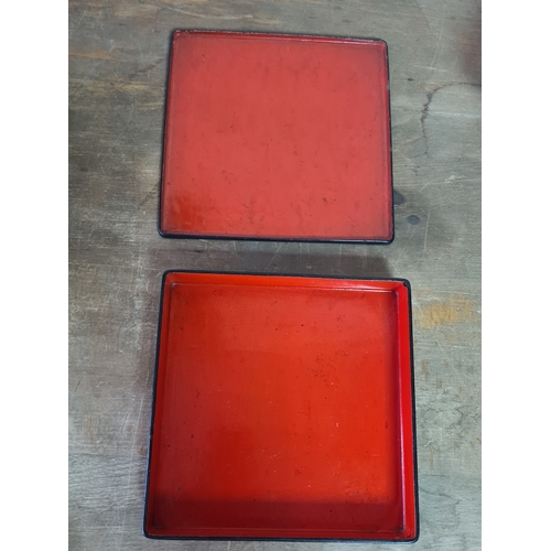 27 - 2 vintage black lacquered lidded boxes with hand painted floral designs, the square Victorian style ... 