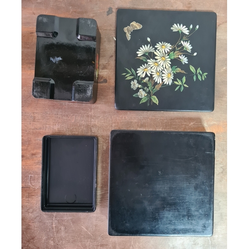 27 - 2 vintage black lacquered lidded boxes with hand painted floral designs, the square Victorian style ... 