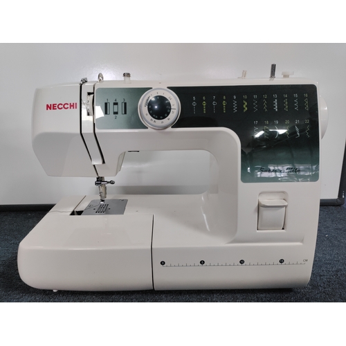 28 - A necchi super utility sewing machine with foot pedal and a singer handy chest