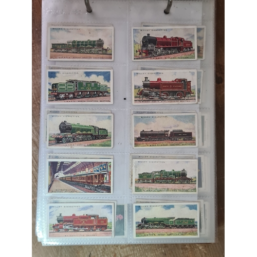 29 - A substantial collection of Cigarettes Cards housed in an album with over 600 cards. Brands mainly c... 