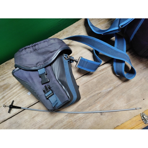 30 - A praktica mtl3 camera with spare lenses, clicker, flash attachment and storage bag