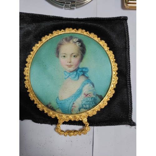 31 - A heart shaped white metal jewellery box and a collection of hand held mirrors and a pair of pill bo... 