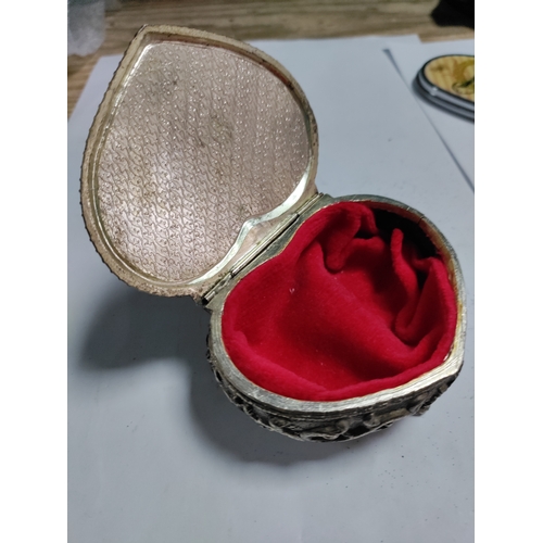 31 - A heart shaped white metal jewellery box and a collection of hand held mirrors and a pair of pill bo... 