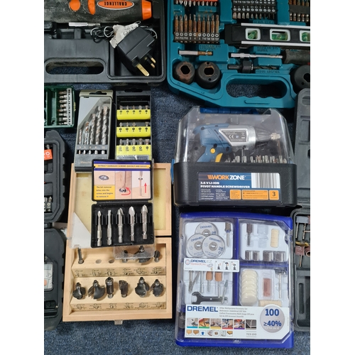 33 - A large job lot of of Drill Bit sets, Dremel tool sets and associated tools, includes a Workzone Piv... 