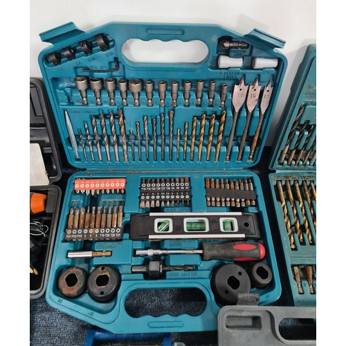 33 - A large job lot of of Drill Bit sets, Dremel tool sets and associated tools, includes a Workzone Piv... 