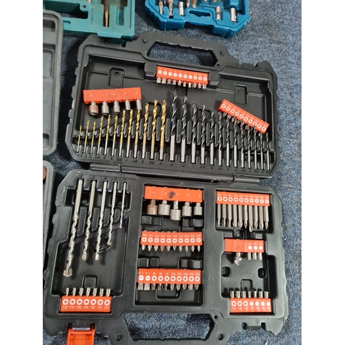 33 - A large job lot of of Drill Bit sets, Dremel tool sets and associated tools, includes a Workzone Piv... 