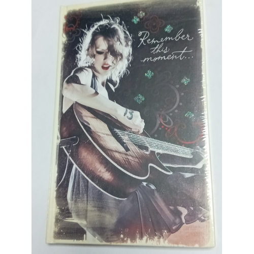 34 - A new and sealed 2010 Taylor Swift remember this moment note pad. Made by Taylor swift productions.