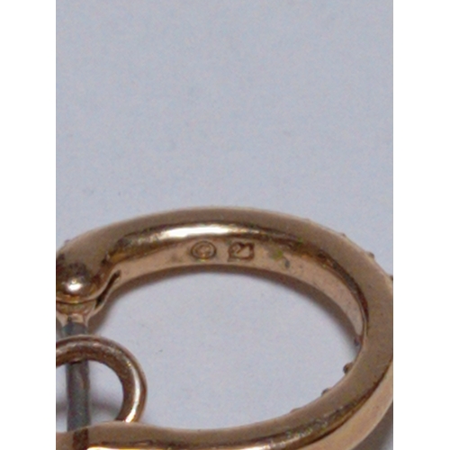 303 - A pair of Swarovski symbolic drop earrings.